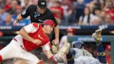 Hoskins homers in return to Philly, but Dahl goes deep in Phillies debut to key 3-1 win over Brewers