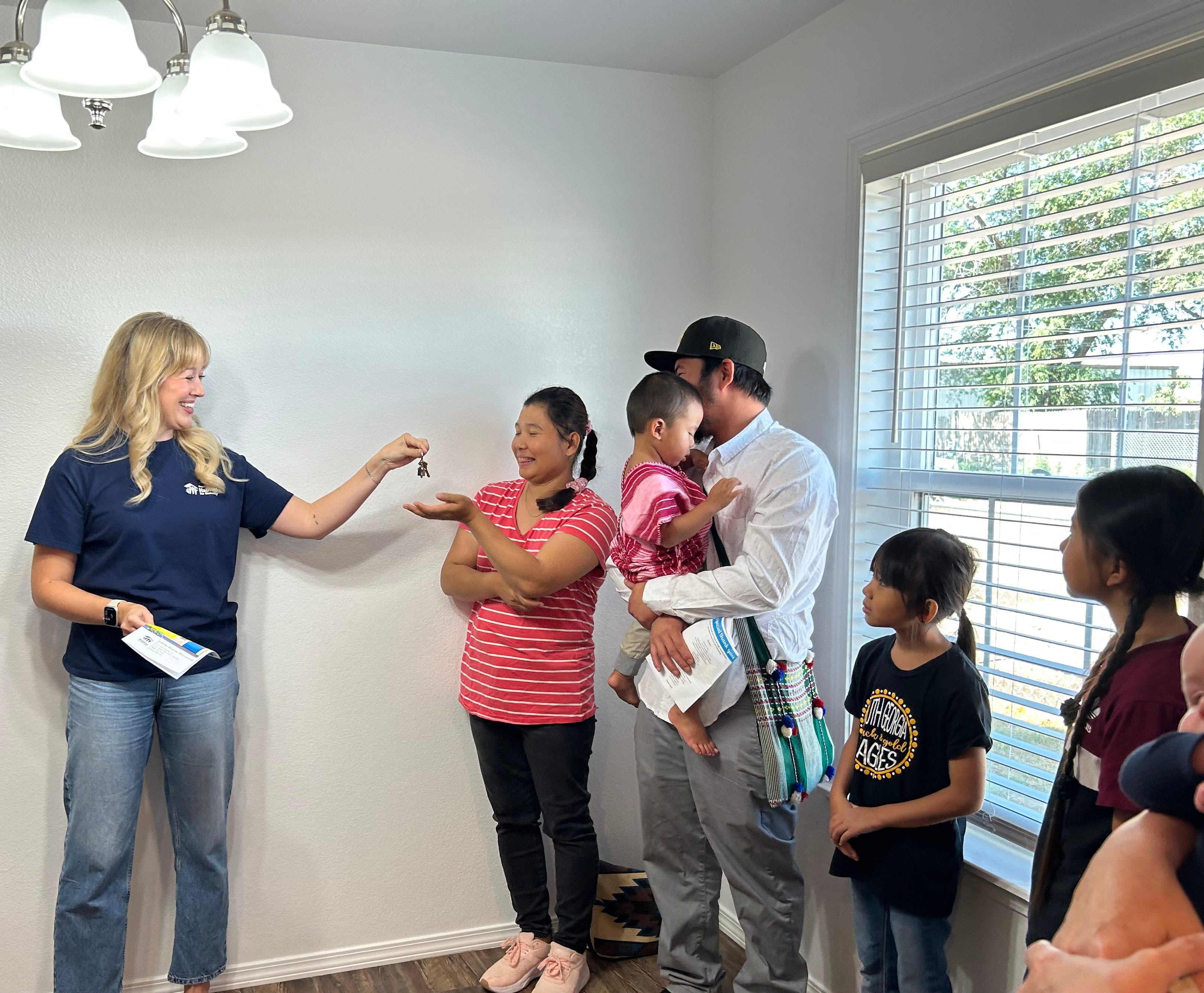 New Habitat house in El Barrio neighborhood goes to group's 120th recipient