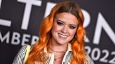 Ava Phillippe Sports Bright Orange Hair and Bikini Top at Celine Runway Show in LA