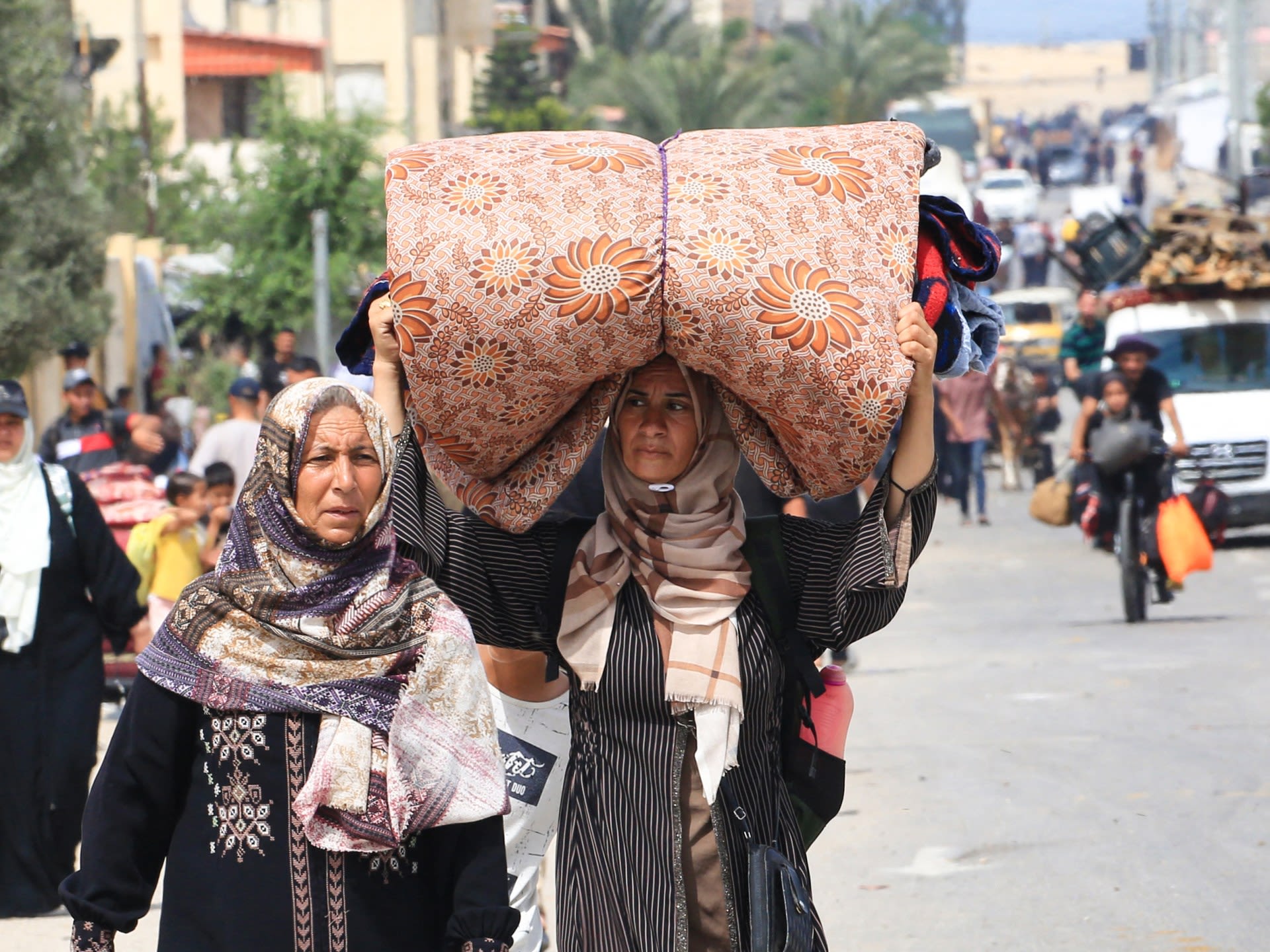 Photos: Palestinians flee Tal as-Sultan area in Rafah amid Israeli assault