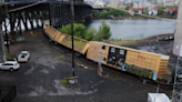 Drone footage reveals extent of Steel Bridge train derailment