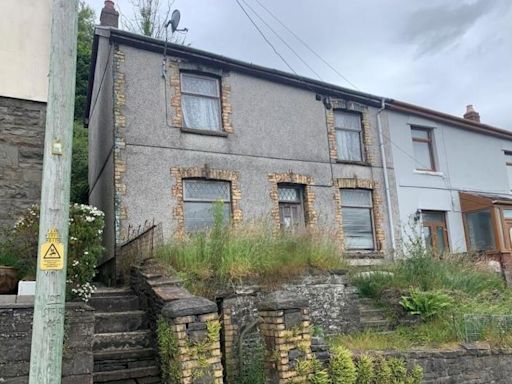 Behind the door of one of Wales’ cheapest houses still scattered with former occupant's possessions