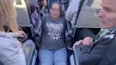 A wheelchair user who was filmed dragging herself toward an airplane bathroom said the cabin crew had refused to help