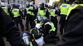 Clashes break out between police and protesters in London night after Southport riot
