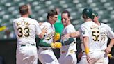 A's hit 2 tying homers in late innings and score 5 runs to rally past Rockies