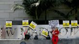 L.A. hotel workers are back on the job, but say more strikes are to come