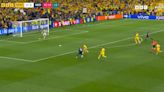 Fans 'throw TRAINERS' on the pitch during Netherlands' win vs Romania