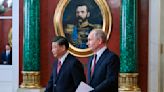 Putin hosts Xi in the Kremlin with imperial palace pageantry