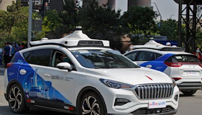 A driverless car hits a person crossing against the light in China