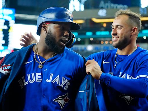 Blue Jays blow 7-run lead, but recover to beat Diamondbacks 8-7 after Guerrero's solo homer