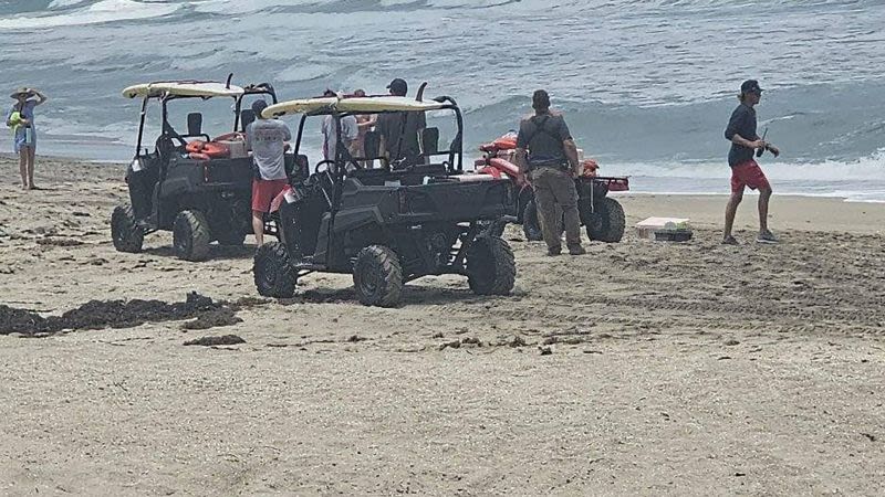 A couple drowns in a Florida rip current while vacationing with their children, authorities say