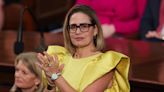 A style expert said Kyrsten Sinema's yellow dress at the State of the Union 'reflects her independent spirit,' but that it 'missed the mark'