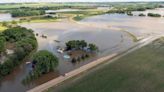 Midwest hit with severe flooding as heat wave persists across US