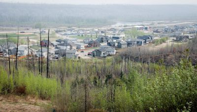 Fire threat eases near Canada's oil sands hub, but a long, hot summer looms