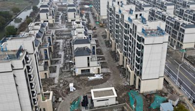 Shanghai eases homebuying rules as China boosts aid