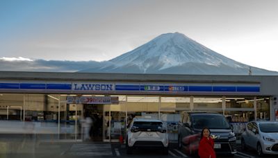 Tourist hot spots from Venice to a town near Mount Fuji are taking drastic measures to cope with overtourism