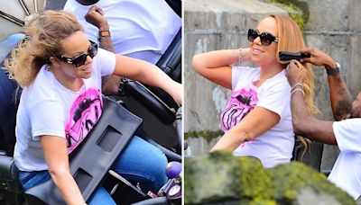 Mariah Carey's Assistant Brushes Her Hair After Going on Rollercoaster Ride