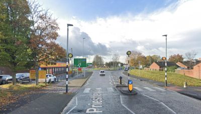 Man found unconscious in road is taken to hospital after electric bike crash