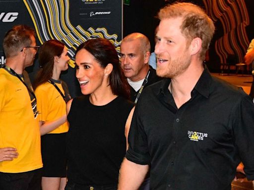 Prince Harry 'Follows Behind His Wife' Meghan Markle at LAX as the Duchess 'Takes Care of Business'