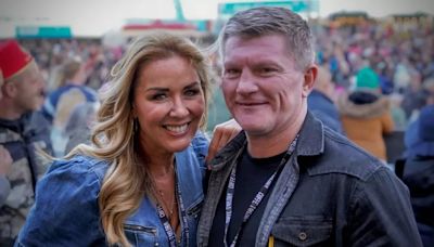 Loved up Ricky Hatton and Claire Sweeney are all smiles as they join thousands at festival