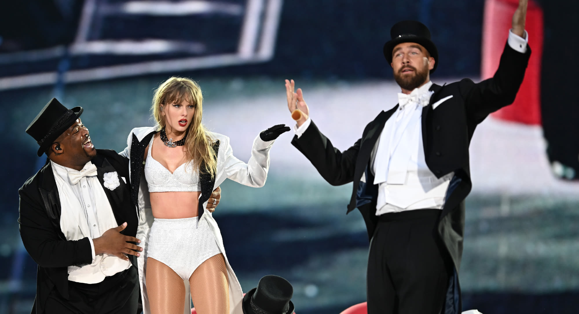 Travis Kelce Joins Taylor Swift Onstage in Victorian-inspired Tuxedo at ‘The Eras’ Tour London Concert