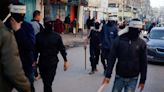With police absent in Gaza, vigilante groups arrive on the streets
