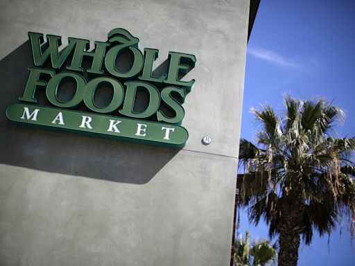 Whole Foods CEO says he is slashing prices on private-label food to battle supermarkets