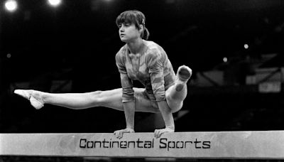 How gymnast got Olympics' first 'perfect 10' - & result 'BROKE' scoreboard