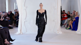 Kim Kardashian wears infamous pant-boots to walk in Balenciaga show at Paris Fashion Week