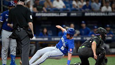 Royals extend their win streak to eight games, score three in the 11th to beat Rays 7-4