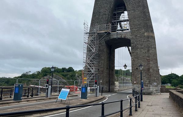 Bristol bridge reopens as police manhunt continues