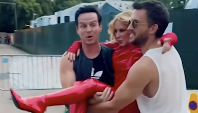 Kylie Minogue carried to BST stage in latex outfit by Andrew Scott and Jonathan Bailey