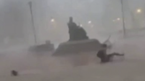 Video shows Kentucky student knocked off feet by severe storm's wind