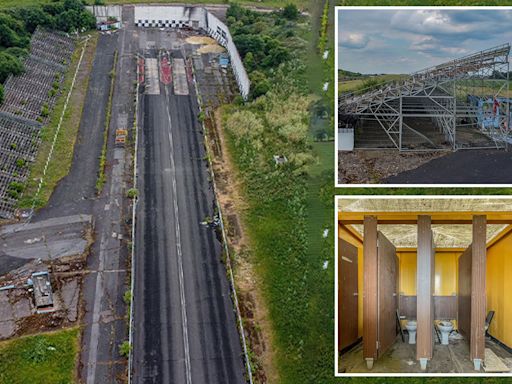 Inside abandoned race track left to rot with weeds growing in grandstand