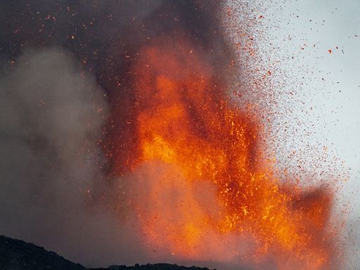 Italy's Mount Etna erupts in fiery display as lava spews from crater over Sicily