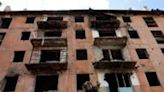 A Russian sapper checks a ruined building in Mariupol, a Russian-controlled city in Ukraine