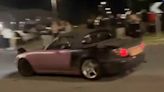 Shocking moment boy racer smashes into pedestrian at car meet