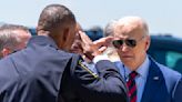 Biden, after meeting with families of officers killed in NC, says the nation is grieving with them