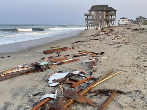 Francine weakens moving inland as the storm leaves behind flooding and widespread power outages