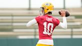 QB Love optimistic extension will happen by camp