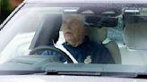 Prince Andrew looks downcast as he drives to Windsor Castle