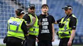 Protester ties himself to Hampden goalpost to delay Scotland-Israel football match