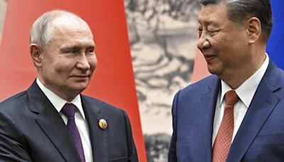 Leaders of Russia and China meet at a Central Asian summit in a show of deepening cooperation