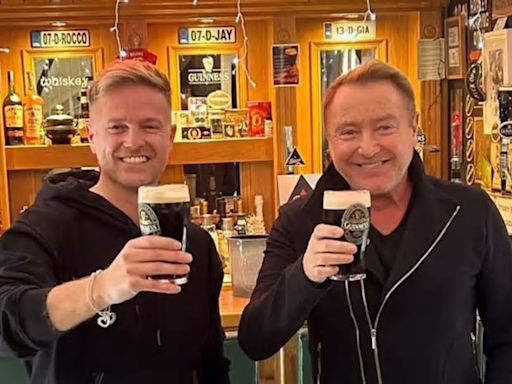 Michael Flatley enjoys pint of Guinness in Westlife star Nicky Byrne's home