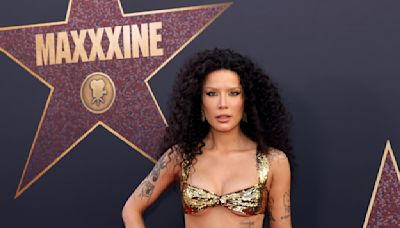 Halsey Channels Cher in Midriff-Baring Gold Gown as Singer Talks ‘MaXXXine’ and Acting Ambitions