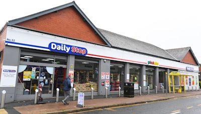 Masked gang broke into a supermarket office and made off with thousands of pounds