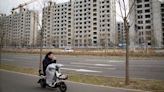 China Says It Will Start Buying Apartments as Housing Slump Worsens