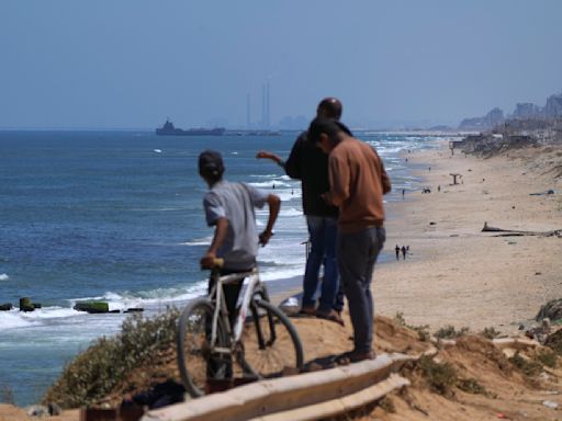 The Latest | US-built aid pier in Gaza will reopen for a few days, then be removed permanently