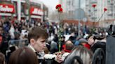 Navalny buried in Moscow as thousands of supporters defy security