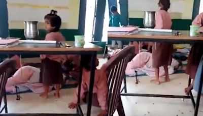 Uttar Pradesh teacher sleeps in classroom as primary school girls fan her: Viral Video | Today News